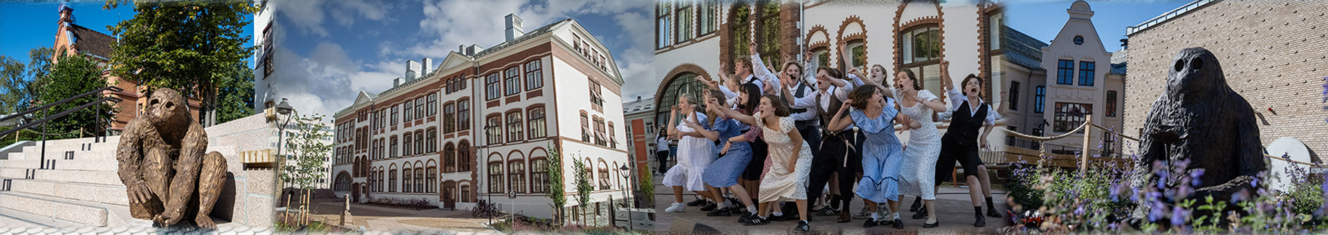 en gruppe mennesker som poserer for et bilde foran en bygning